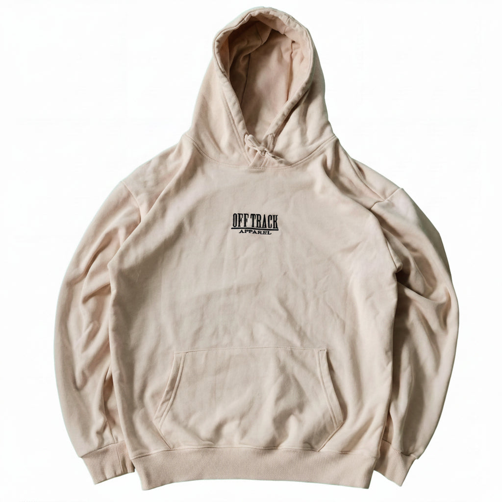 Beige hoodie with 'OFF TRACK' text on a white background